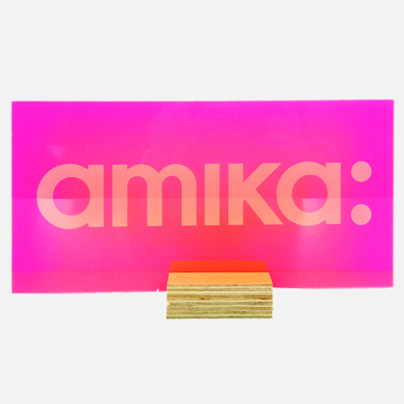 amika: logo block pink acrylic